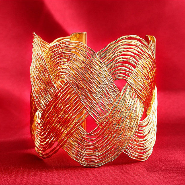 ROMANCE The Interlocking Waves Bracelet Vista Shops