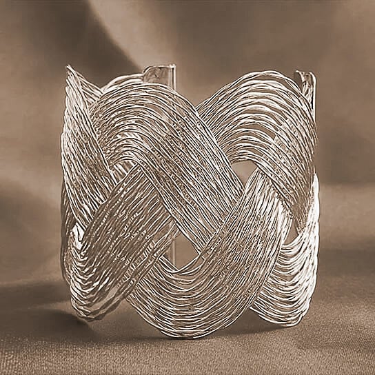 ROMANCE The Interlocking Waves Bracelet Vista Shops